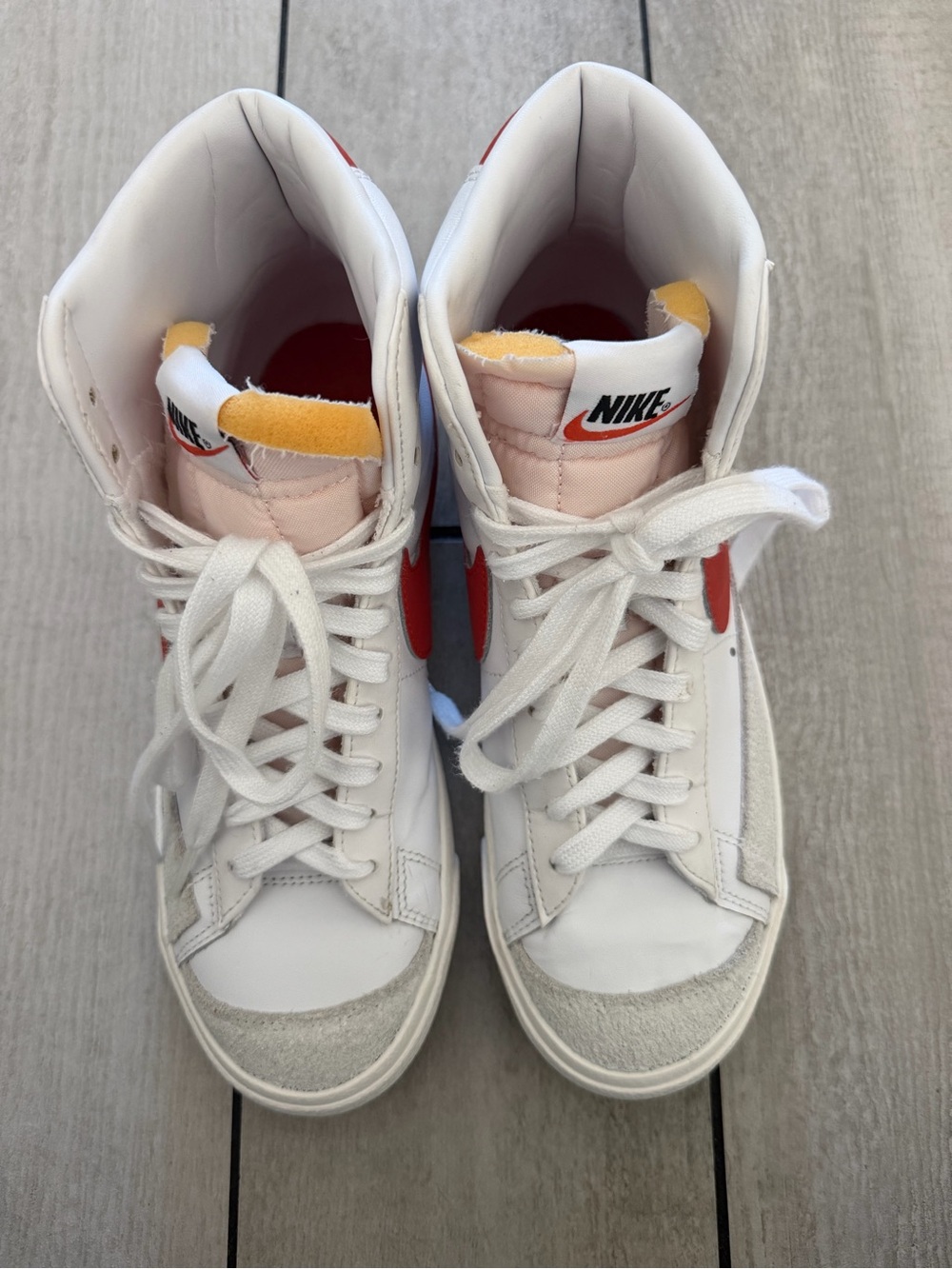 Nike Women’s White Sneakers with Red Swoosh and Pink Tongue